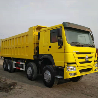 Sinotruk HOWO 8X4 371HP camion di scarico giallo di seconda mano con tipo di trasmissione manuale