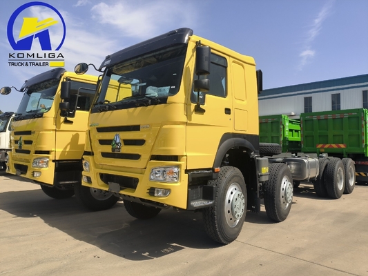 Sinotruk HOWO T7 8X4 400 CV rimorchio pesante camion trattore con 5600X2300X1500 secchio