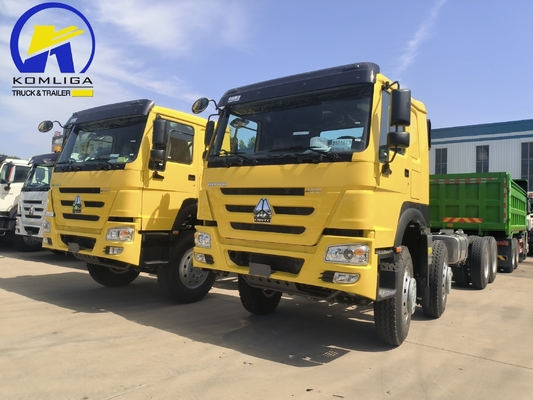 Sinotruk HOWO T7 8X4 400 CV rimorchio pesante camion trattore con 5600X2300X1500 secchio