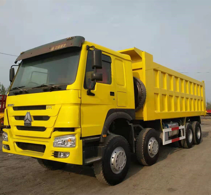 Sinotruk HOWO 8X4 371HP camion di scarico giallo di seconda mano con tipo di trasmissione manuale