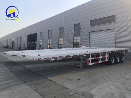Sinotruk HOWO semirimorchio a letto piatto con assi Fuwa e trave laterale in acciaio a canale da 16 mm