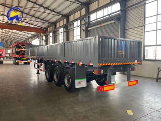 Semi-remolchio per il trasporto di container da 20 ft a 40 ft con parete laterale e pneumatici 315/80r22.5.12r22.5