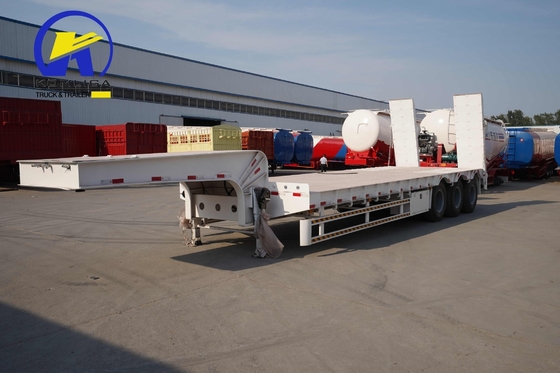 Semi-remolchi lowboy a letto piatto con tre assi pesanti e sistema di sospensione meccanica